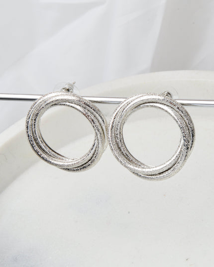 Shimmering Silver Twisted Round Earrings